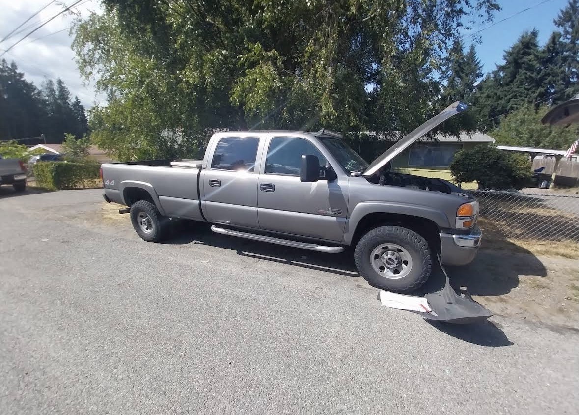 Mikey working on a GMC truck
